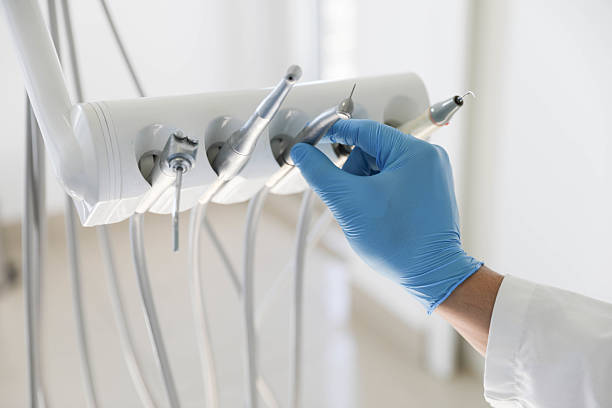 Professional Dental Implants technician working in Kaser, NY